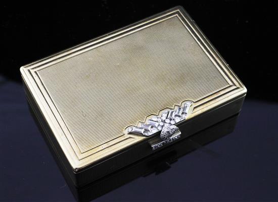 A 1940s Art Deco Cartier 9ct gold and diamond rectangular box, gross 86.5 grams.